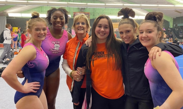 Maverick Gymnastics Slider for Mrs. Nancy with some of the girls at Big Dog 2021