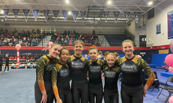Maverick Gymnastics Slider for Xcel Golds ready to compete at the Peace Out Meet